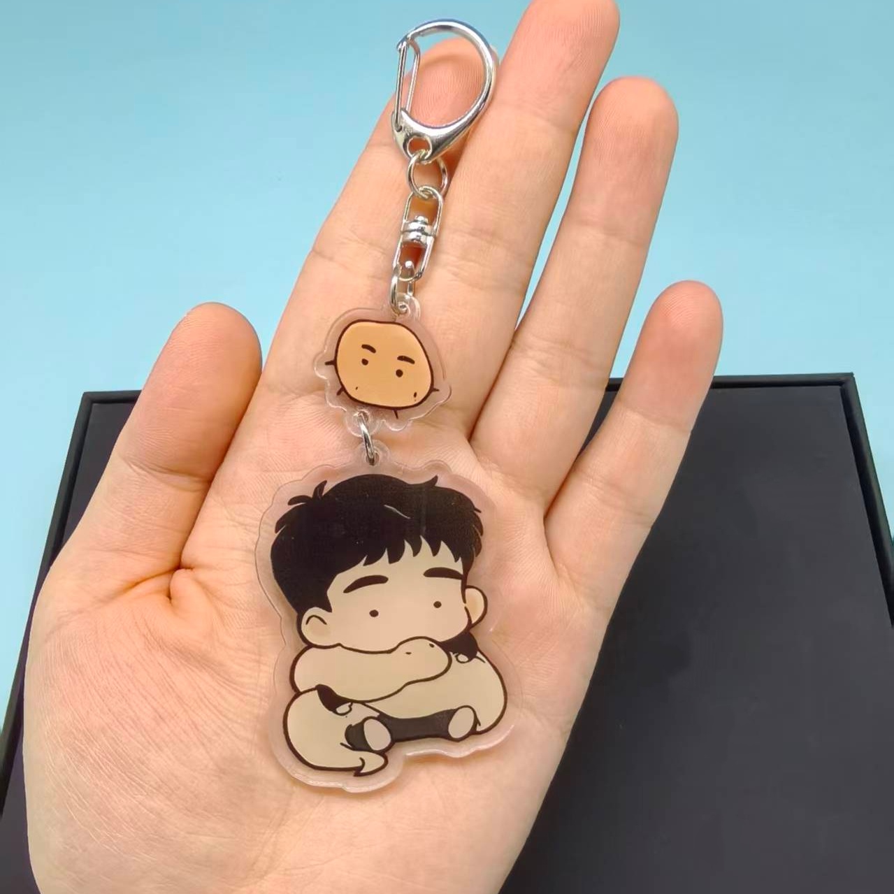 The Sacred Serpent's Seduction - Gaming Console Keychain recension och pris
