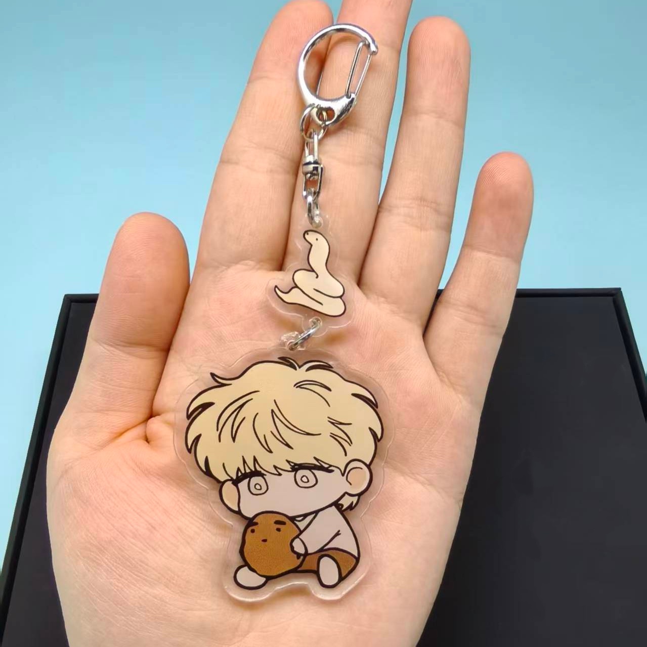 The Sacred Serpent's Seduction - Gaming Console Keychain recension och pris